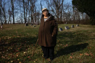 Janis Ivory in the cemetery where her parents are buried in Rendville, OH where she grew up. Janis, her brother Harry and others are working to revitalize the old coal town.